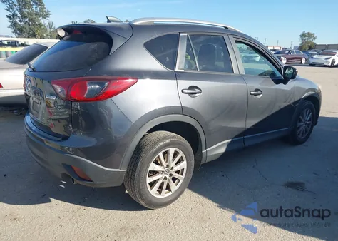 2014 Mazda Cx-5 Touring z USA, uszkodzony, nr VIN JM3KE2CY5E0332991